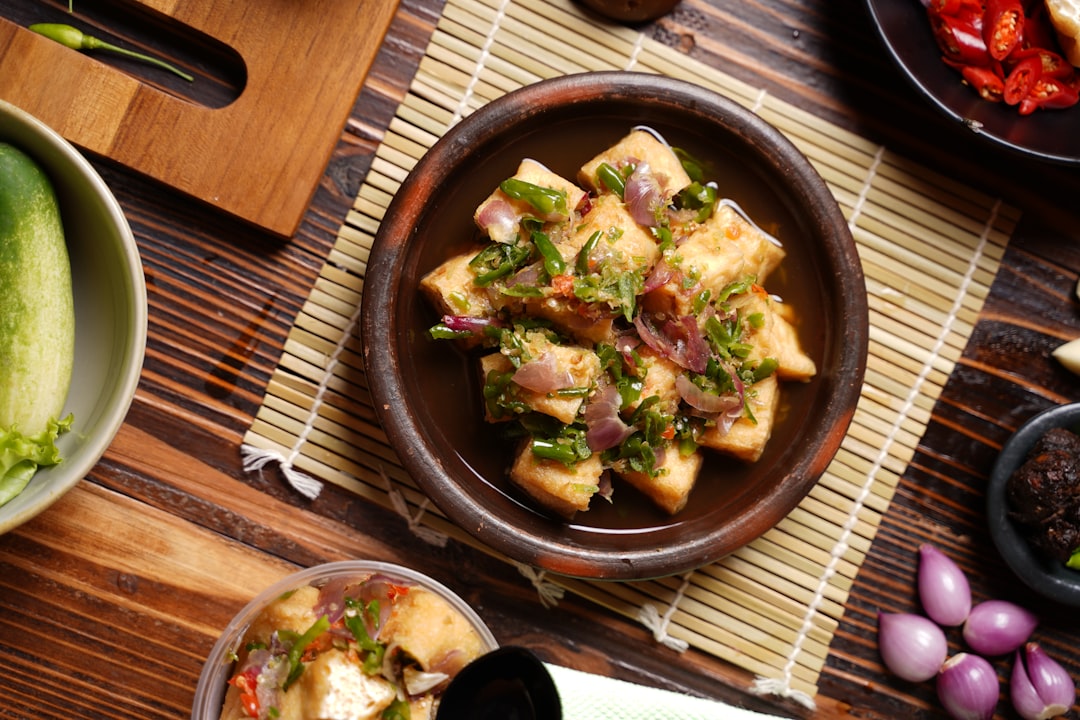 Indonesian Local Delicacy, Tahu Gejrot. Fried tofu with sweet and spicy Grinded Bird eye Sambal.