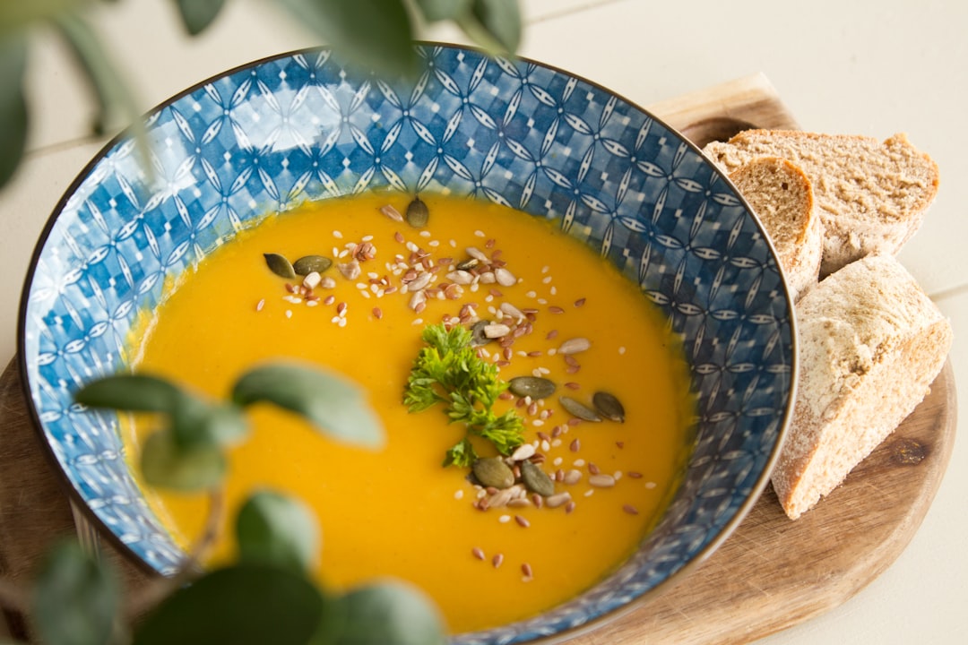 For my Photography 2A module we had to take a photograph of soup and bread. Because my lecturer’s satire is often aimed at the vegan students in the class, I decided to humour him and shoot a vegan soup with gluten free artisan bread, just to ‘grate him up’ so to say.